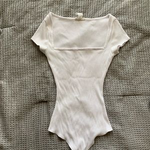 Off white square neck bodysuit.